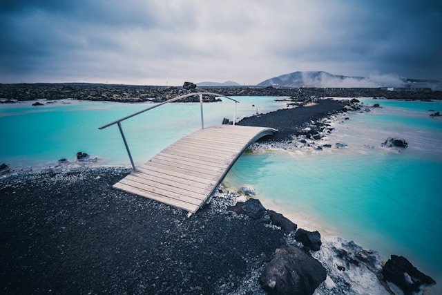 People relaxing in the geothermal waters of the Blue Lagoon spa